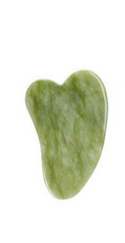 Gua sha en pierre de jade - Massage visage et détente naturelle